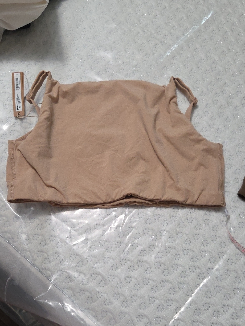 Nylon blend seamless scoop bralette, SKIMS.  Includes Brown Bandau (Not Branded)